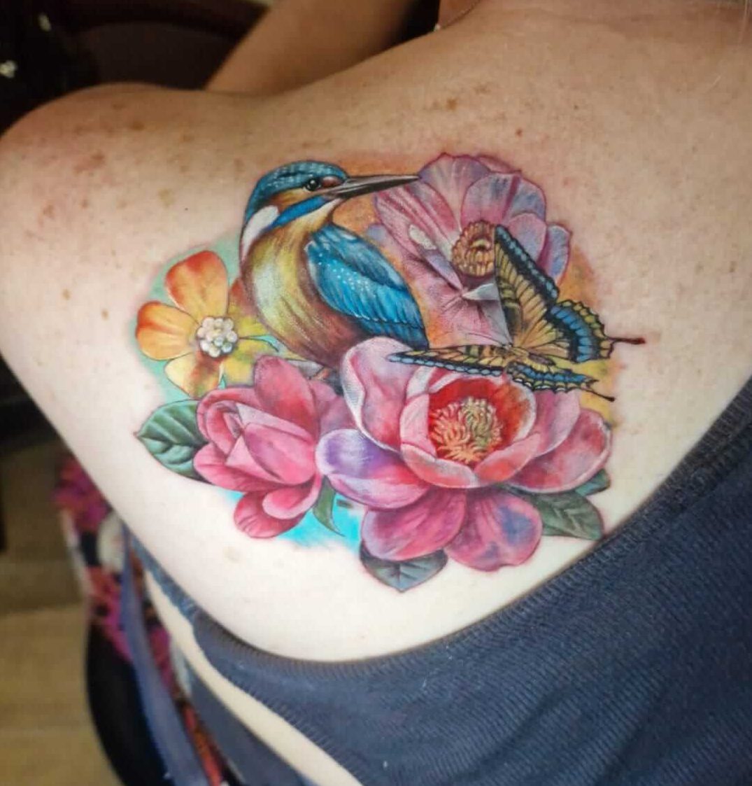 Birds and flowers cover up tattoo after Worthing